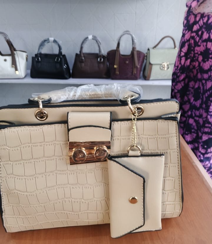 Cream croc-embossed bag set with matching pouches