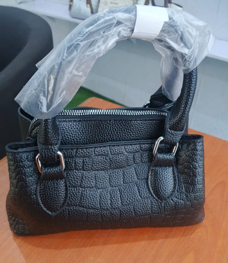 Black croc-embossed barrel bag